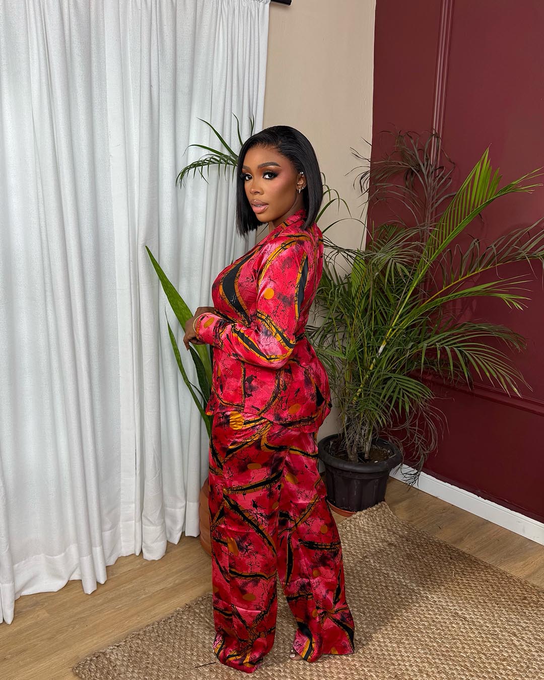 Silk Set Luxe Red – A Button-Down Shirt and Wide-Leg Pant Set in an Abstract Mixed Print
